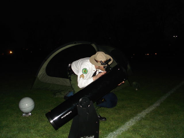 NYC Park Ranger Gazing through Telescope